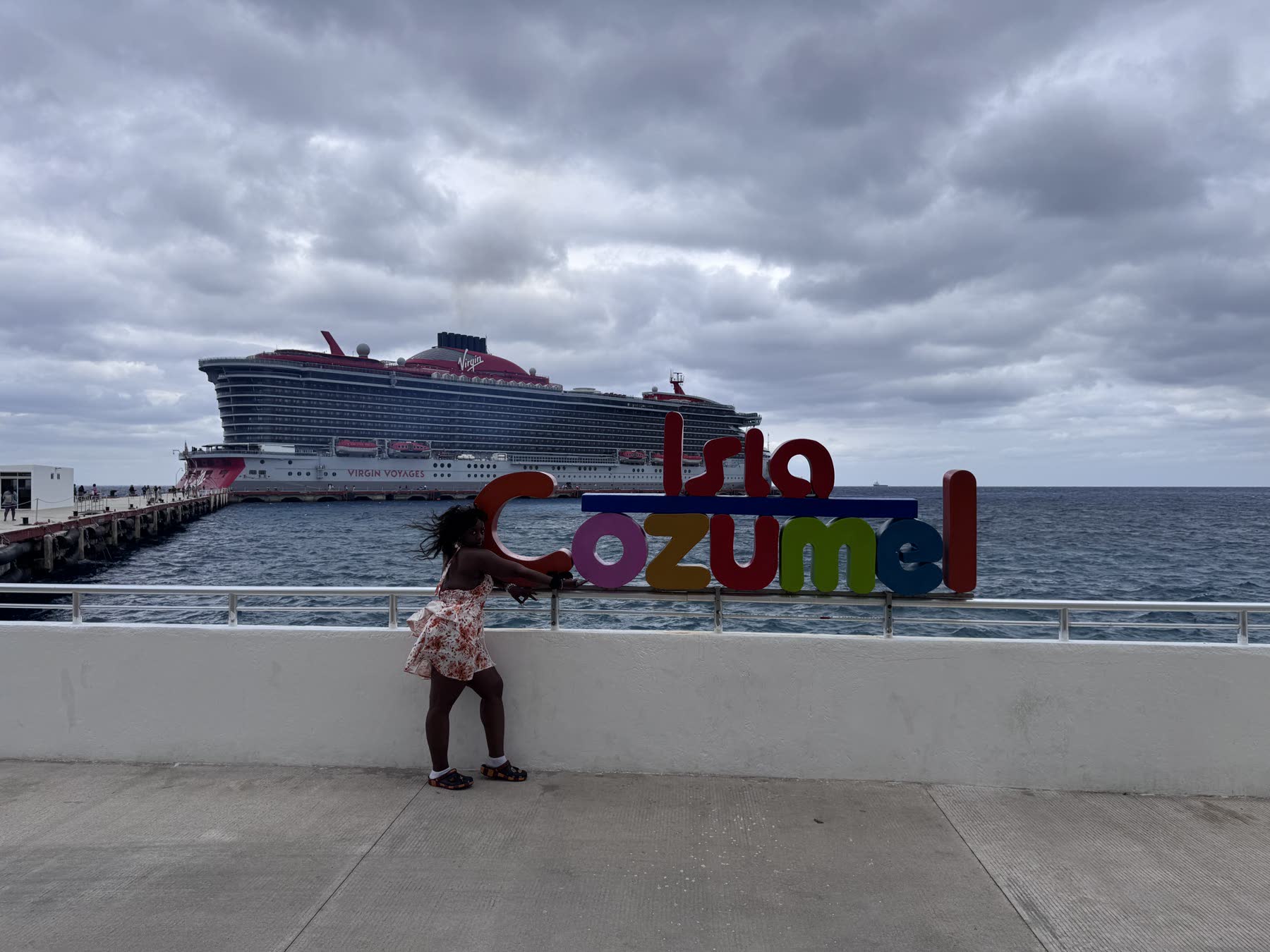 Cozumel pier with a Virgin Voyages ship